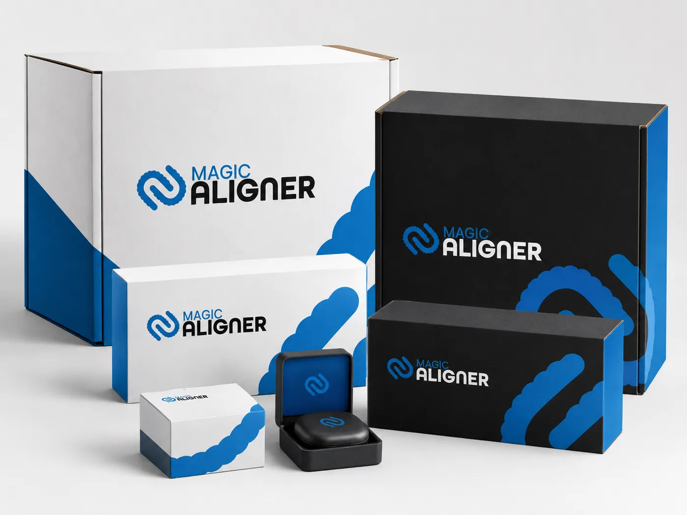 Aligner Magic outer boxes in white, black and brand blue.